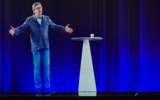 Mélenchon holds a meeting in Dijon as his holograms appear at the same time in Nantes, Montpellier, Grenoble, Clermont-Ferrand, Le Port de la Reunion and Nancy
