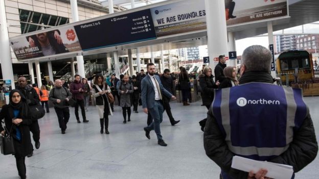 Northern, Southern rail and Merseyrail staff on strike - BBC News