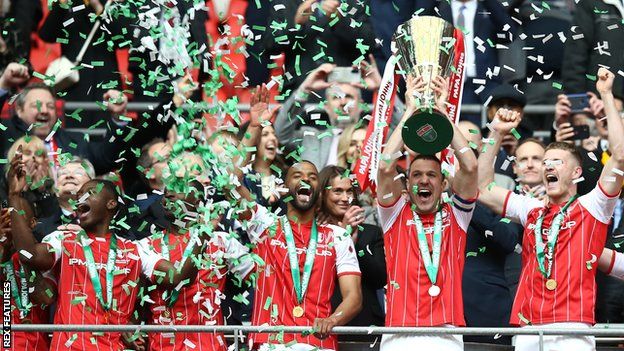 Rotherham players celebrate their EFL Trophy final victory