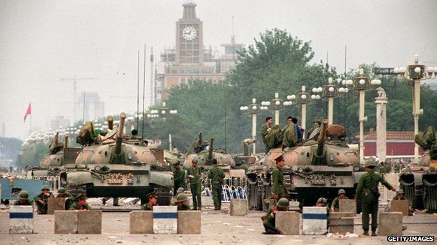 The People's Liberation Army (PLA) tanks guard a strategic Chang'an Avenue leading to Tiananmen Square 6 June 1989