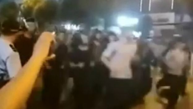 Social media footage of police in Wuhan