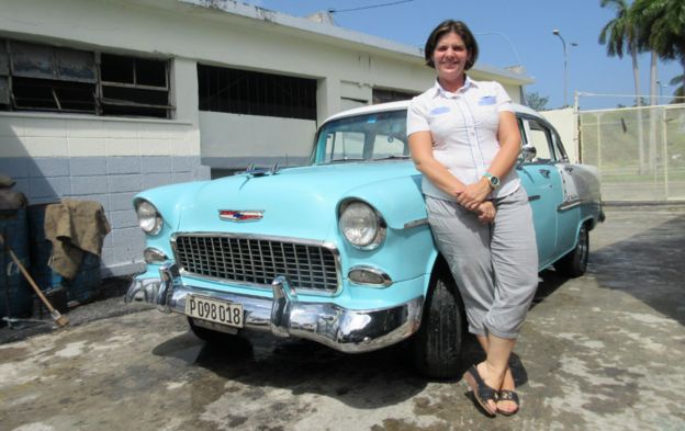 Nidialys with one of her classic cars