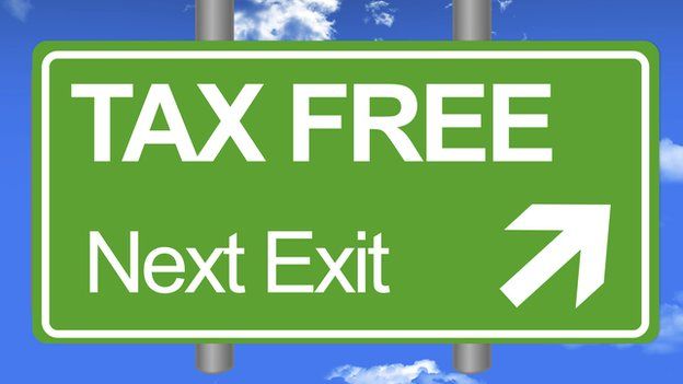 A sign saying "Tax Free - next exit"