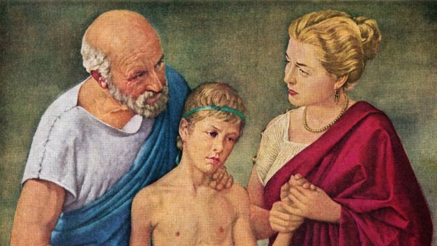 Imagen de Hipócrates y su esposa curando a un niño.