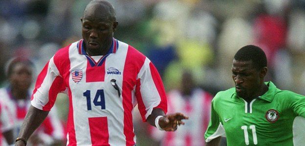 George Weah in action for Liberia against Nigeria in 2001