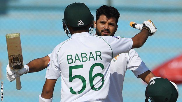Pakistan captain Azhari Ali (right) hugs Babar Azam (left) after hitting a century in the second Test against Sri Lanka