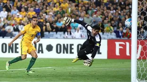 Tim Cahill scores one of his two match-winning goals against Syria