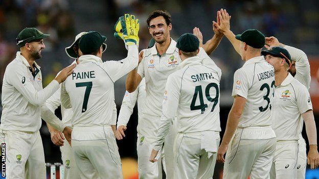 Australia bowler Mitchell Starc celebrates with his team-mates