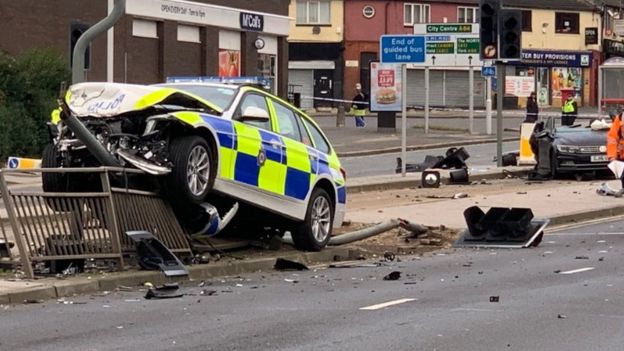 Women hurt in crash with police car responding to 999 call - BBC News