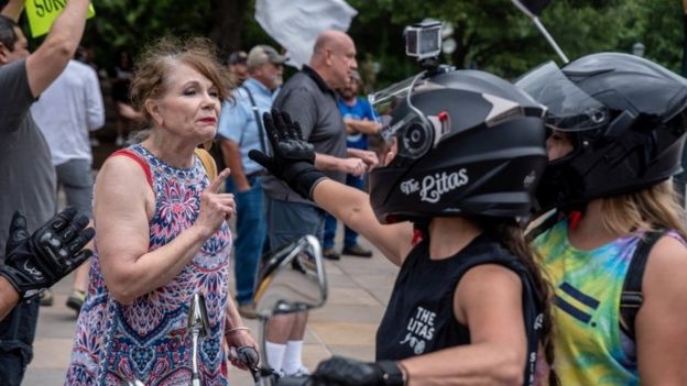 People protest against mandates to wear masks amid the coronavirus outbreak in Austin, Texas, 28 June 2020