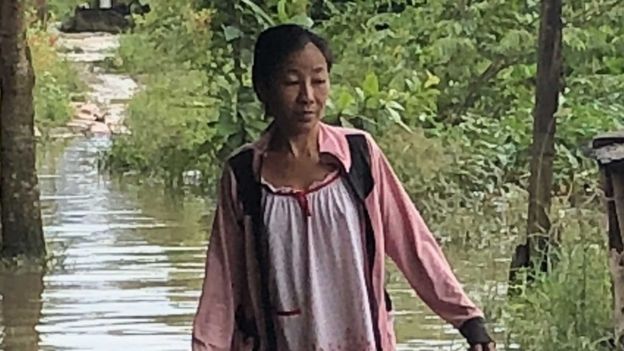 A woman in a flood was taken in Can Tho City, Vietnam
