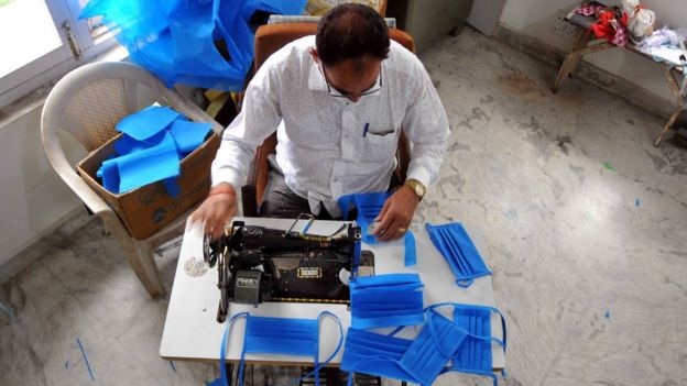 A man making masks