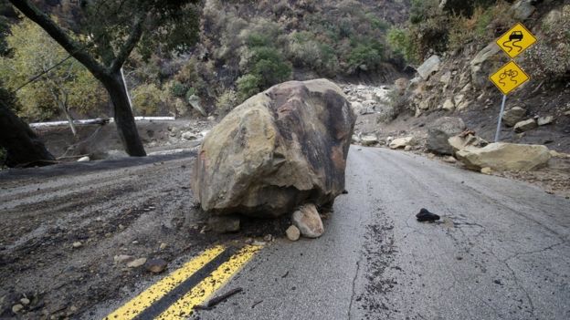 boulder on road
