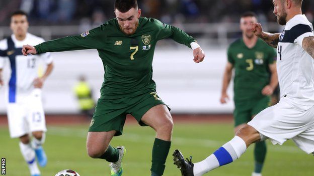 The Republic of Ireland's Aaron Connolly attempts to get past Finland's Joona Toivio
