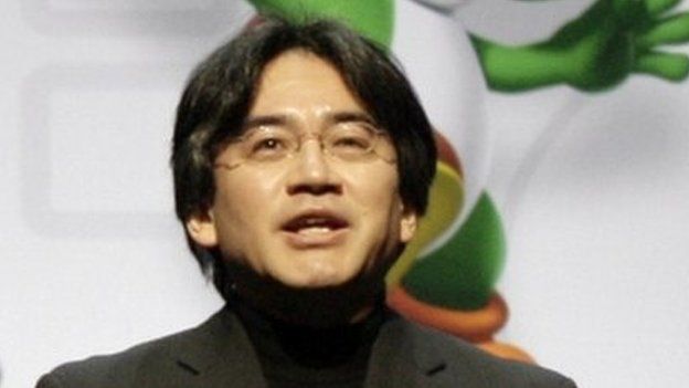 Nintendo President Satoru Iwata speaks as he unveils a Nintendo