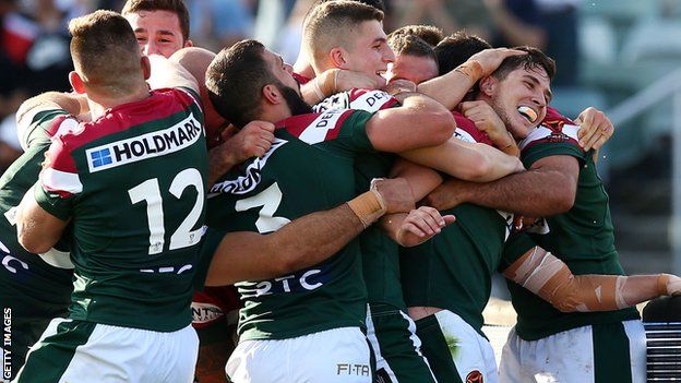 Lebanon players celebrate a try by Mitchell Moses during their 29-18 victory over France in the Rugby League World Cup on Sunday
