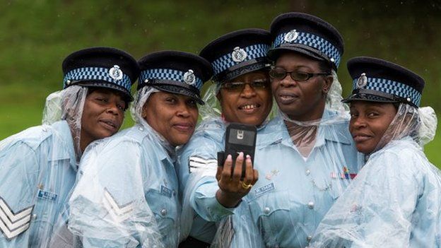 Police woman take a selfie photograph