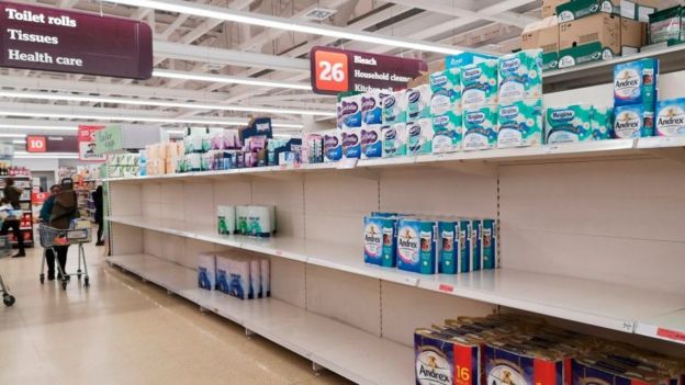 Empty shelves in the tissue paper aisle in a supermarket in London on March 4, 2020