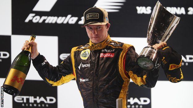 Kimi Raikkonen celebrates on the podium after winning the 2012 Abu Dhabi Grand Prix for Lotus