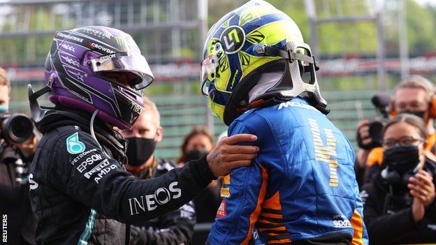 Lewis Hamilton and Lando Norris congratulate each other
