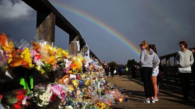 Floral tributes on a bridge near the A27