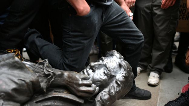 Protesters pull down a statue of Edward Colston during a Black Lives Matter protest