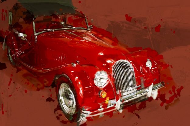 Pintura de auto clásico rojo.