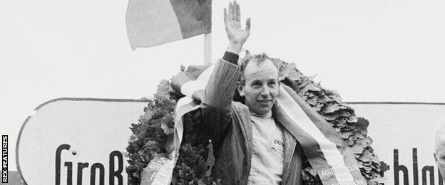 John Surtees celebrates winning a Grand Prix in 1964