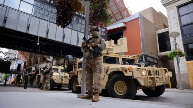 Members of the National Guard are seen in the street in Louisville