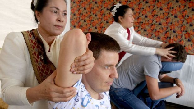 Visitors receive traditional Thai massage at the 6th Thai culture festival held by the Royal Thai Embassy in Moscow