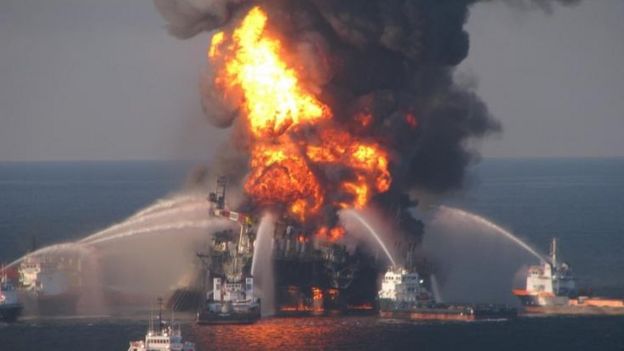 Fire boat response crews battle the blazing remnants of the offshore oil rig Deepwater Horizon