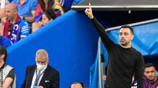 Barcelona manager Xavi gives his side some instructions