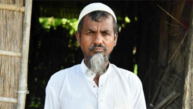 In this photo taken on August 29, 2019, Saheb Ali, 55, poses for a photograph at his home in Khutamari village in Goalpara district, some 160km from Guwahati, the capital city of Indias northeastern state of Assam