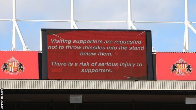 A message on the big screen at the Stadium of Light asking fans not to throw missiles