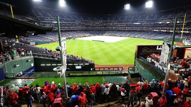 Fans wait in the rain at Philadelphia's Citizens Bank Park