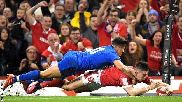 Josh Adams scores for Wales against Italy in last year's Six Nations