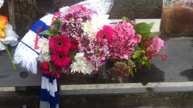 Floral tribute to Matthew Grimstone and Jacob Schilt