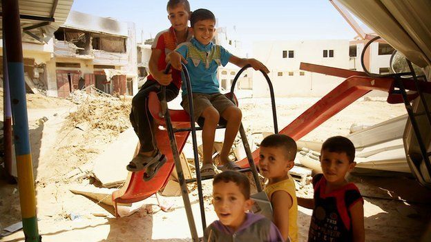 Children in the rubble of Gaza