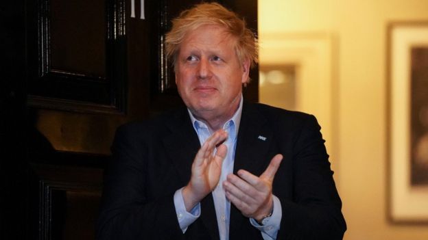 Boris Johnson clapping NHS workers