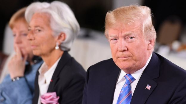 German Chancellor Angela Merkel, Christine Lagarde and US President Donald Trump during the Gender Equality Advisory Council working breakfast on the second day of the G7 Summit on June 9, 2018 in Quebec City, Canada