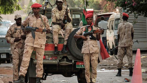Members of Sudan's Rapid Support Forces (RSF) paramilitaries stand guard in the capital Khartoum - 16 June 2019