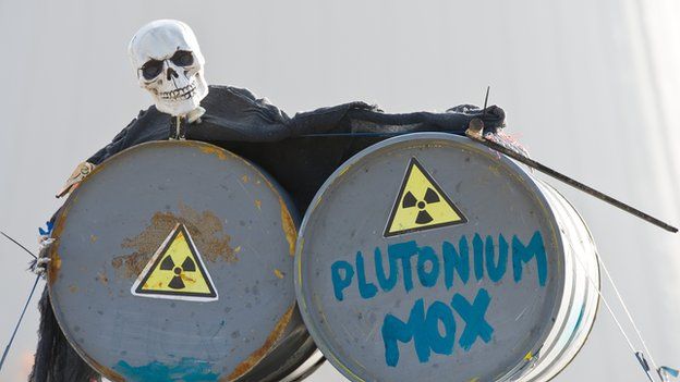 A skeleton is placed over two metal barrels in Grohnde, eastern Germany by anti-nuclear protestors