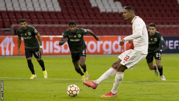 Ivory Coast striker Sebastien Haller scoring a penalty for Ajax Amsterdam
