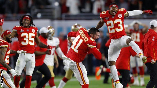 Chiefs players celebrate after the final play of the game