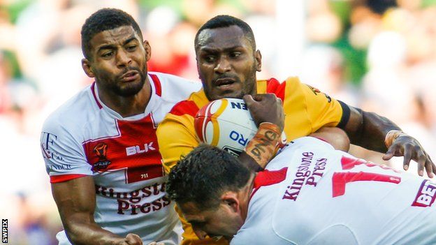 Kato Ottio (centre) played for Papua New Guinea in their quarter-final loss to England at the Rugby League World Cup in November
