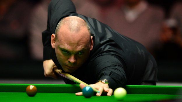 Stuart Bingham of England plays a shot during his quarter final match of the Dafabet Masters