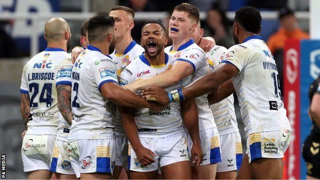 Kruise Leeming celebrates with Leeds team-mates