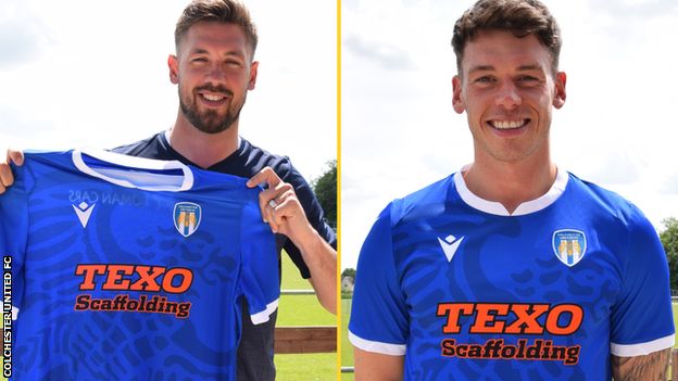 Luke Chambers (left) and Luke Hannant pose with a Colchester shirt