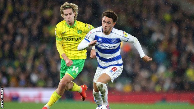 Luke Amos of Queens Park Rangers is challenged by Todd Cantwell of Norwich City during the Sky Bet Championship between Norwich City and Queens Park Rangers