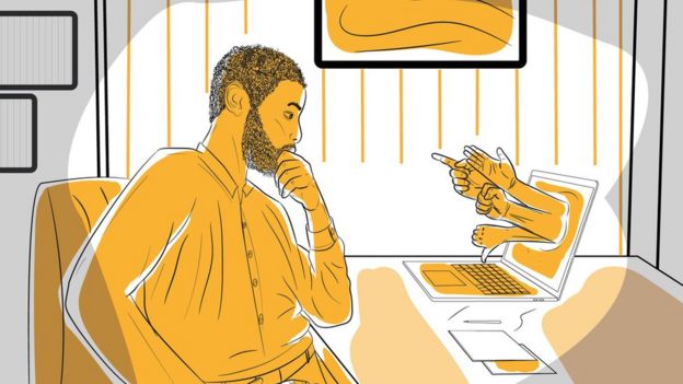 Man looking at a computer screen